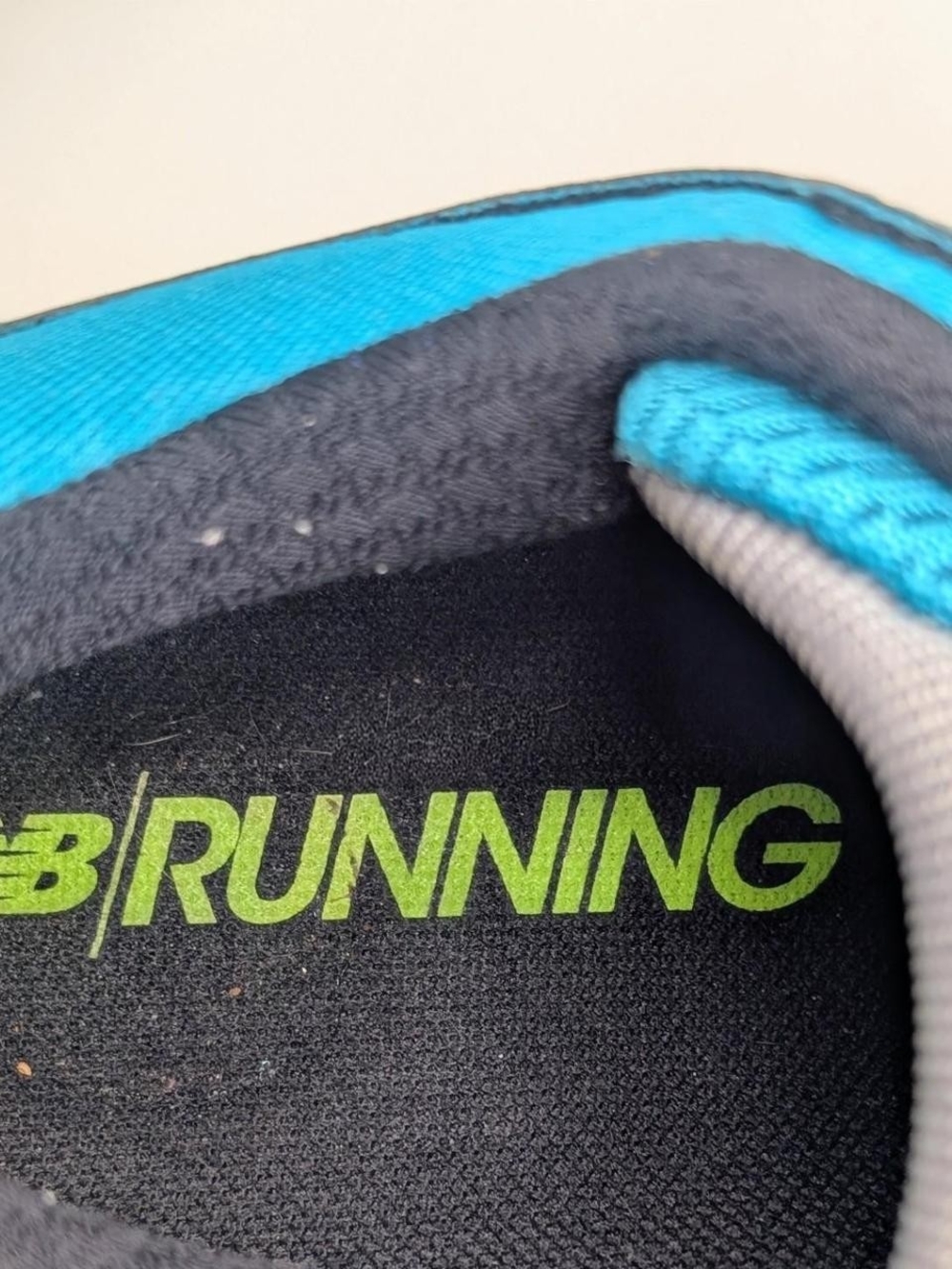 Women’s New Balance 1260v7 running shoes in Pisces blue with lime green accents - Picture 4 of 7